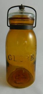 Appraisal: Fruit jar Fruit jar- 'Globe' quart yellow amber ground lip