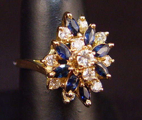 Appraisal: K SAPPHIRE AND DIAMOND RING K yellow gold ring with