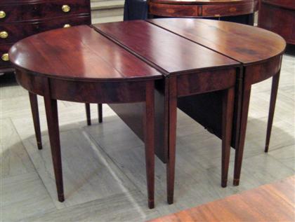 Appraisal: Federal three-part inlaid mahogany dining tablecirca