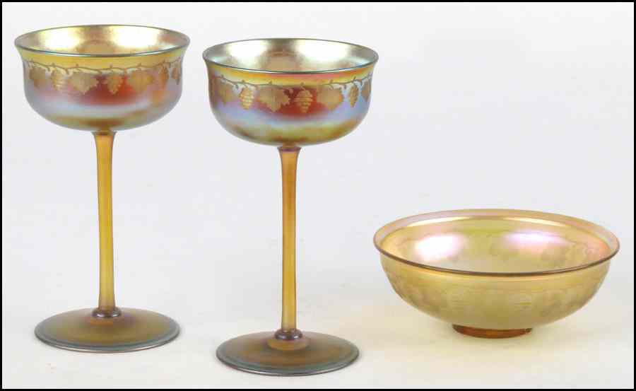 Appraisal: PAIR OF TIFFANY FAVRILE GOBLETS Both with gold favrile finishes