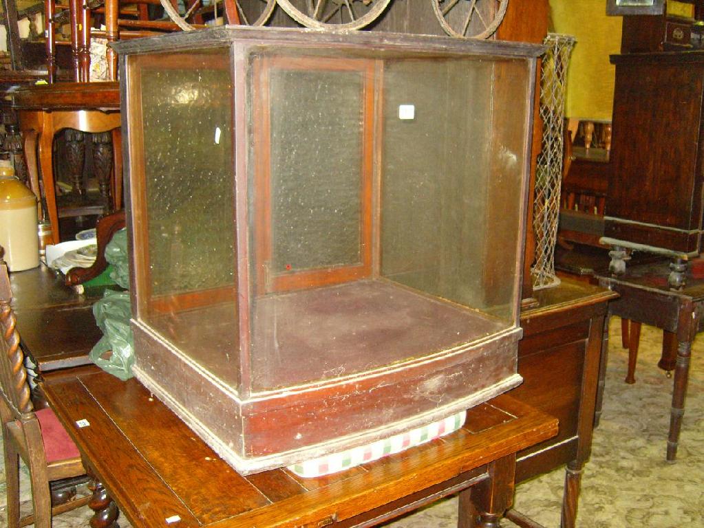 Appraisal: A bow fronted counter top display case with plate glass