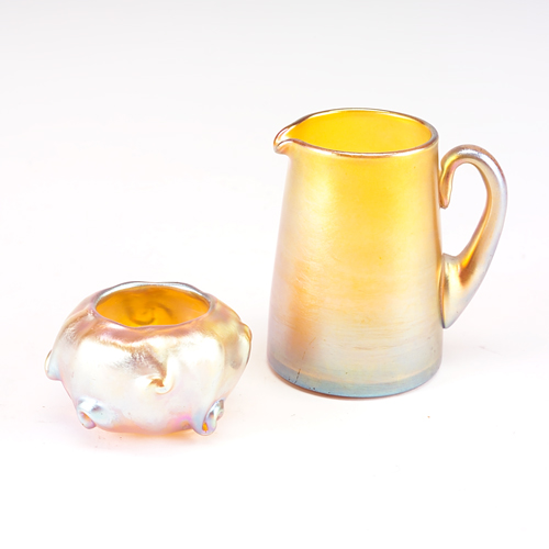 Appraisal: TIFFANY Gold Favrile glass creamer and salt Creamer engraved L