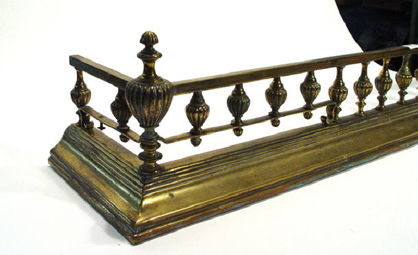 Appraisal: Victorian brass fender with bulbous reeded supports cm long