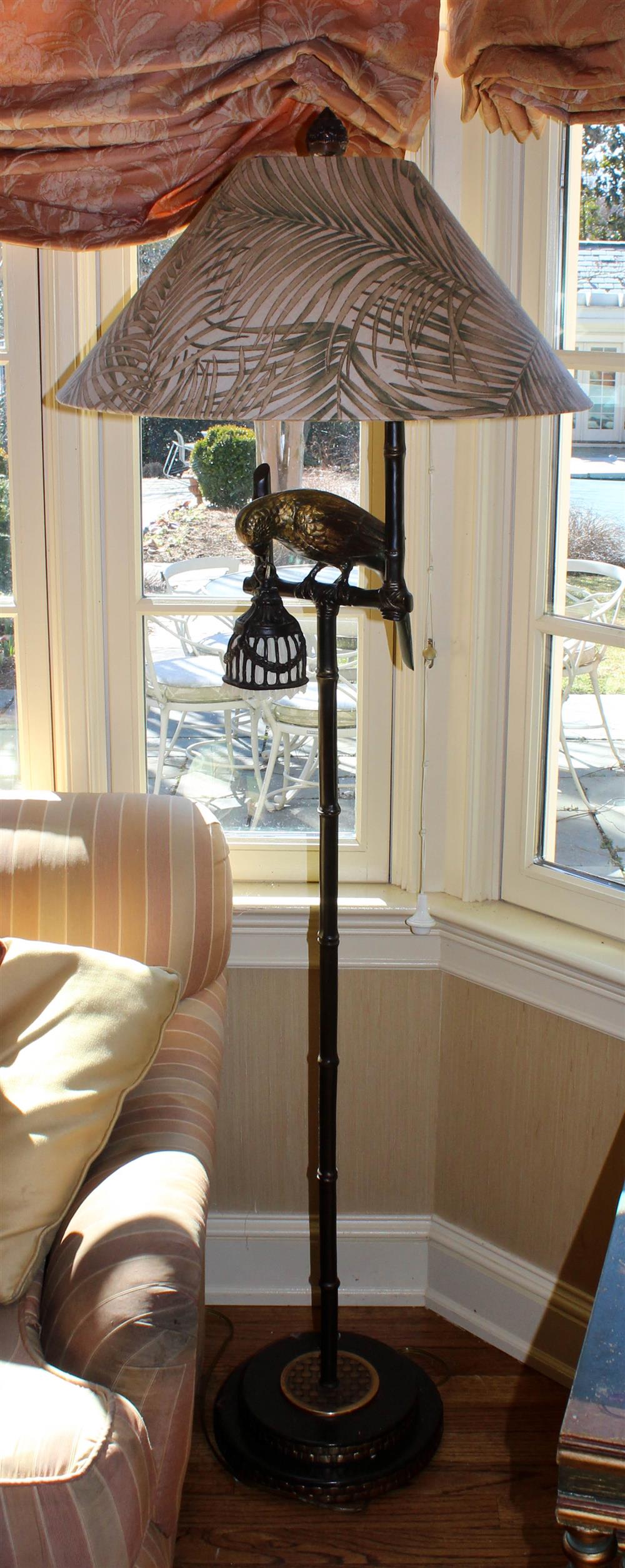 Appraisal: FREDERICK COOPER FLOOR PARROT LAMP the bird holding a lighted