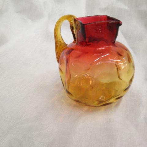 Appraisal: Amberina Art Glass Creamer Pitcher thumbprint square top dippled excellent