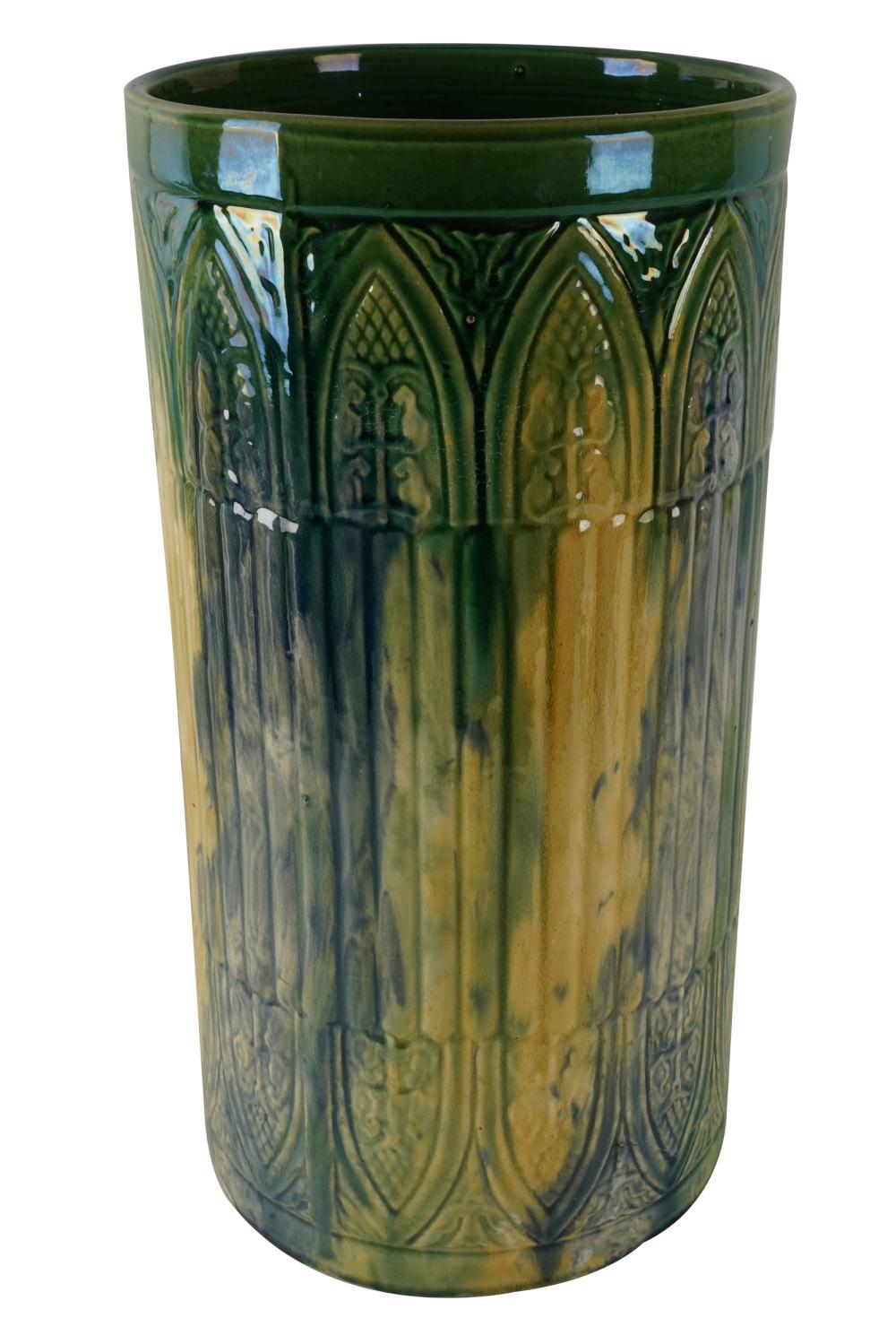 Appraisal: MAJOLICA UMBRELLA STANDunmarked with molded borders of pointed arches glazed