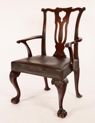 Appraisal: A George II style mahogany open armchair with scroll crest