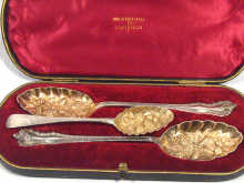 Appraisal: A pair of silver berry spoons with gilt bowls in