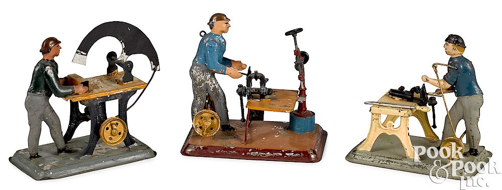 Appraisal: Wunderlich tin workmen steam toy accessories Three Wunderlich painted tin