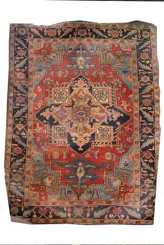 Appraisal: A CAUCASIAN PALE BLUE GROUND CARPET with stylised central panel