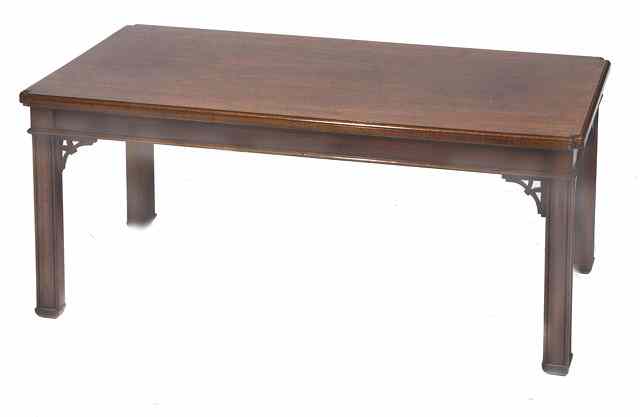 Appraisal: A GEORGE III STYLE RECTANGULAR MAHOGANY LOW TABLE the top