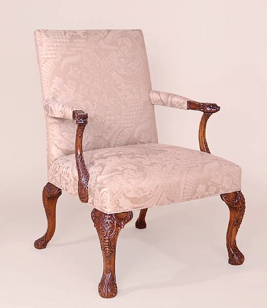 Appraisal: A pair of George III style mahogany library chairs Each