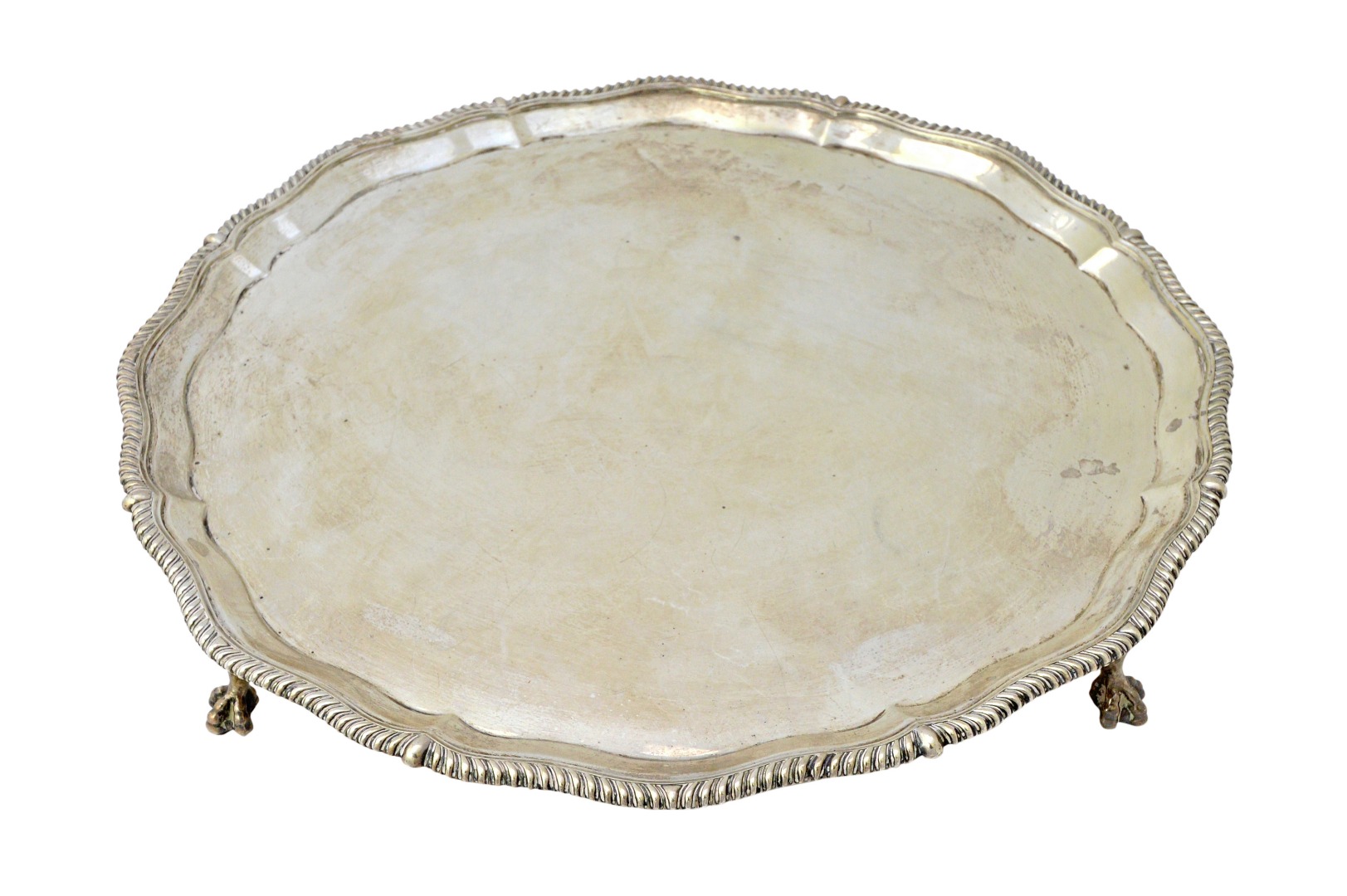 Appraisal: A silver salver of shaped circular form in the Chippendale