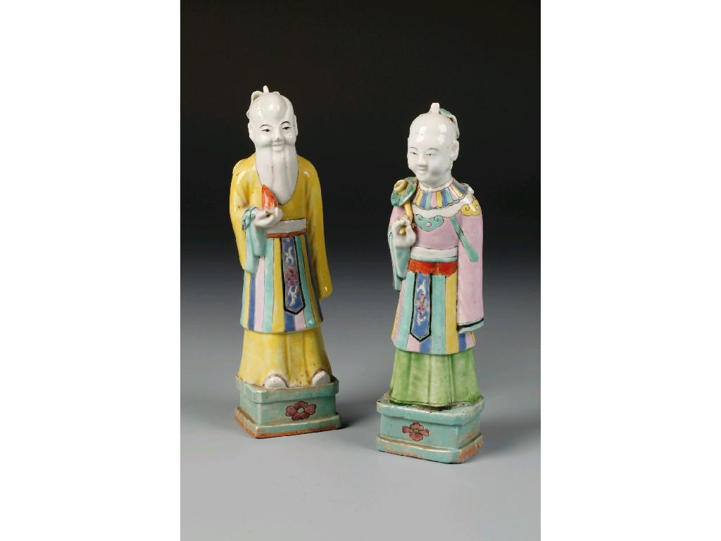 Appraisal: A PAIR OF CHINESE PORCELAIN FIGURES decorated in polychrome enamels