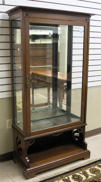 Appraisal: MAHOGANY AND GLASS CHINA CABINET ON STAND Continental c a