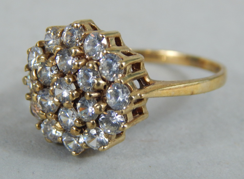 Appraisal: A ct gold dress ring set with white paste stones