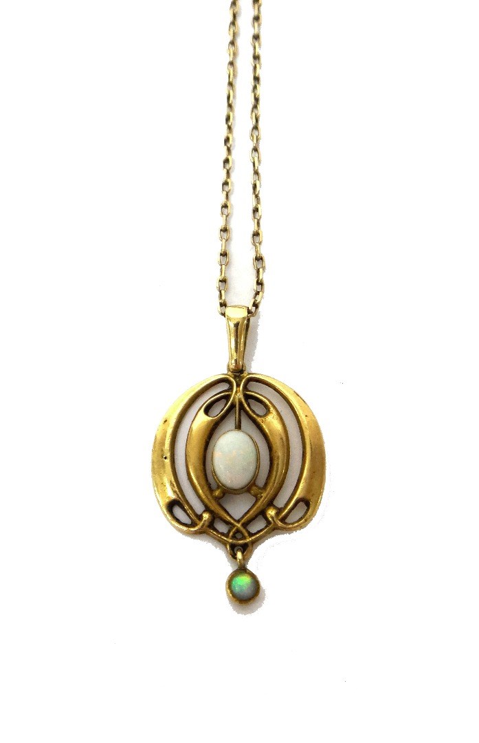 Appraisal: A ct gold and opal set two stone pendant in