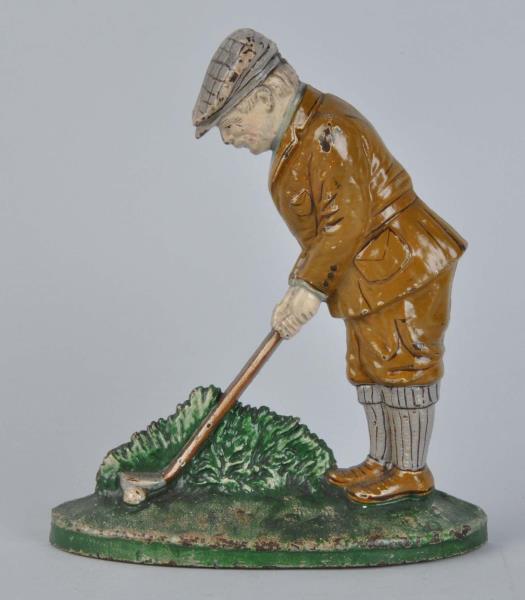 Appraisal: Cast Iron Putting Golfer Doorstop Made by Hubley and numbered