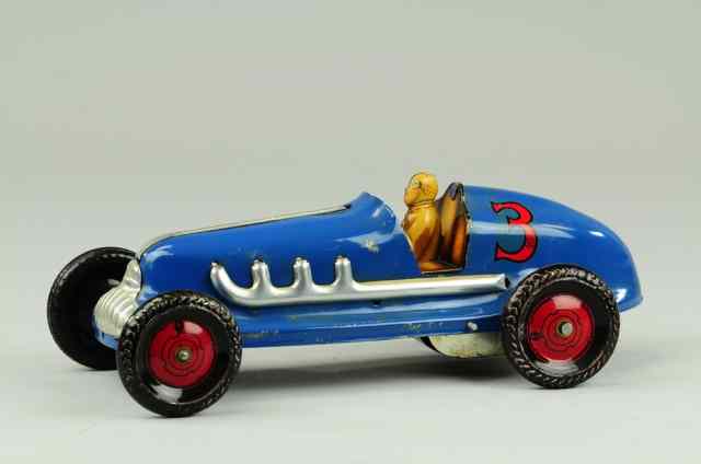 Appraisal: MARX RACER Pressed steel painted in blue with nickel pipes