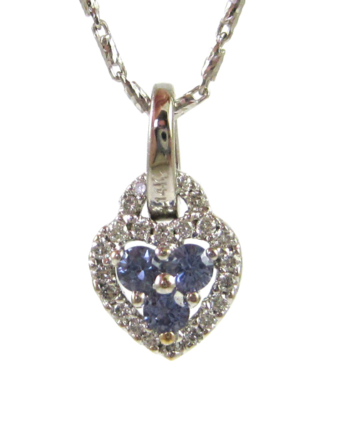 Appraisal: TANZANITE AND DIAMOND PENDANT NECKLACE with a inch k white