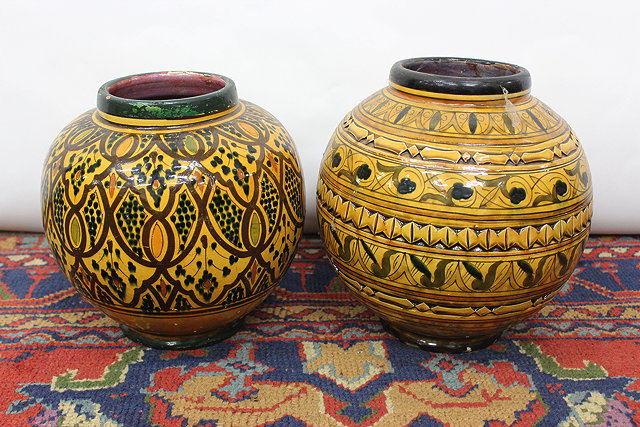 Appraisal: TWO HONEY COLOURED GEOMETRICALLY DECORATED OVOID VASES each marked to