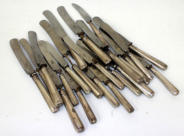 Appraisal: TWENTY ONE CONTINENTIAL SILVER HANDLED KNIVES