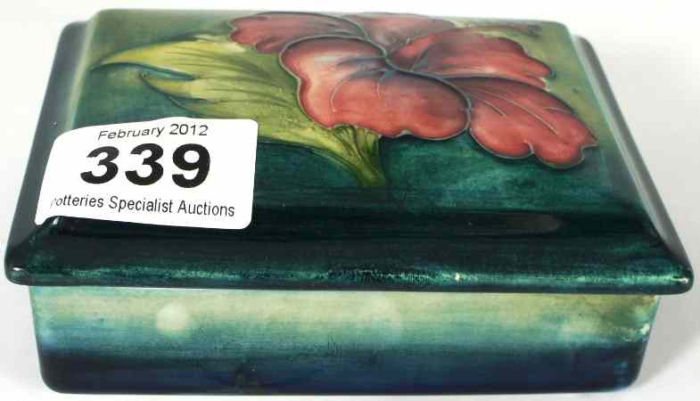 Appraisal: Moorcroft Box and cover decorated with Hibiscus restuck chip to