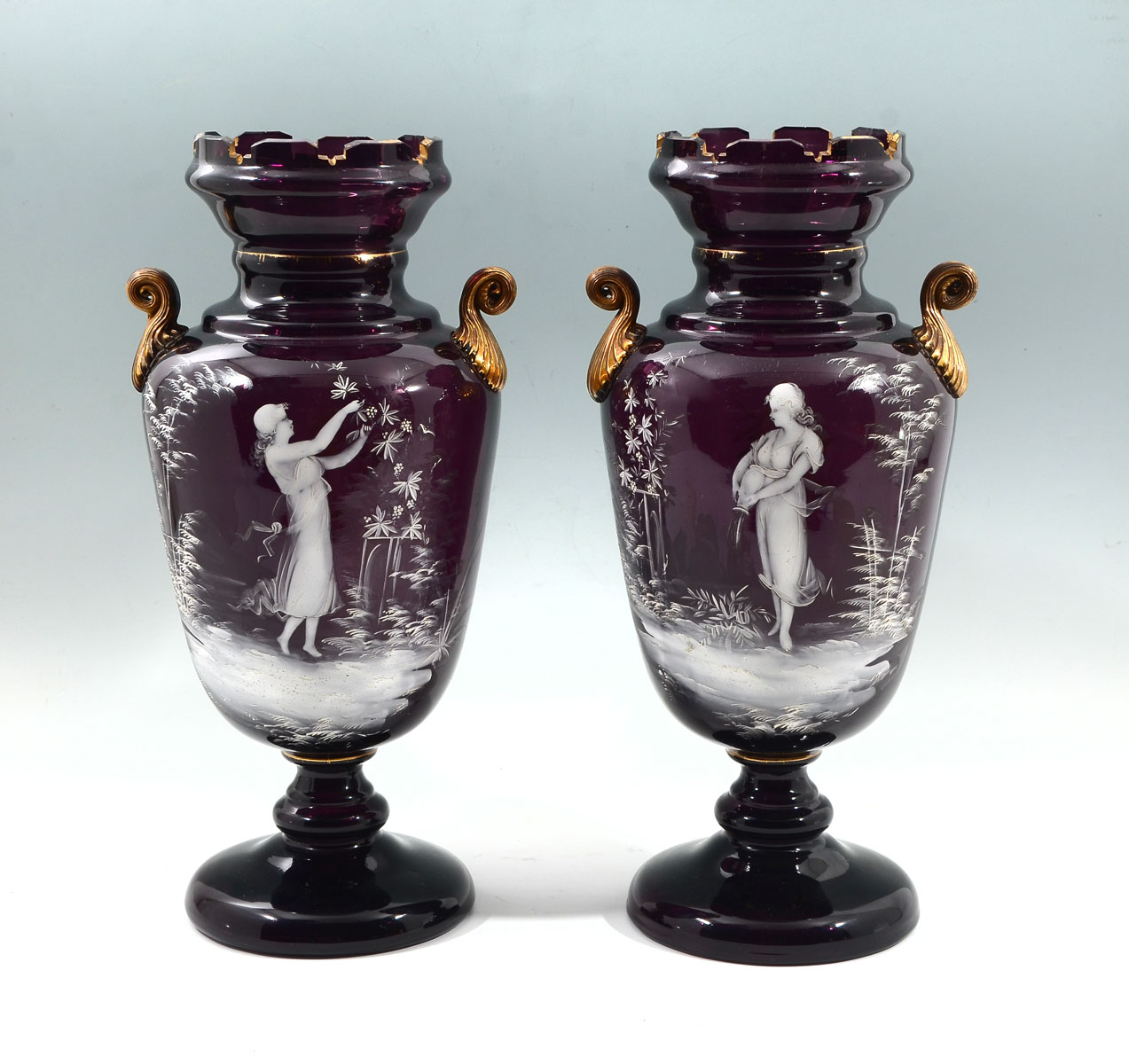 Appraisal: MARY GREGORY AMETHYST VASES Mary Gregory Amethyst vases having hand-painted