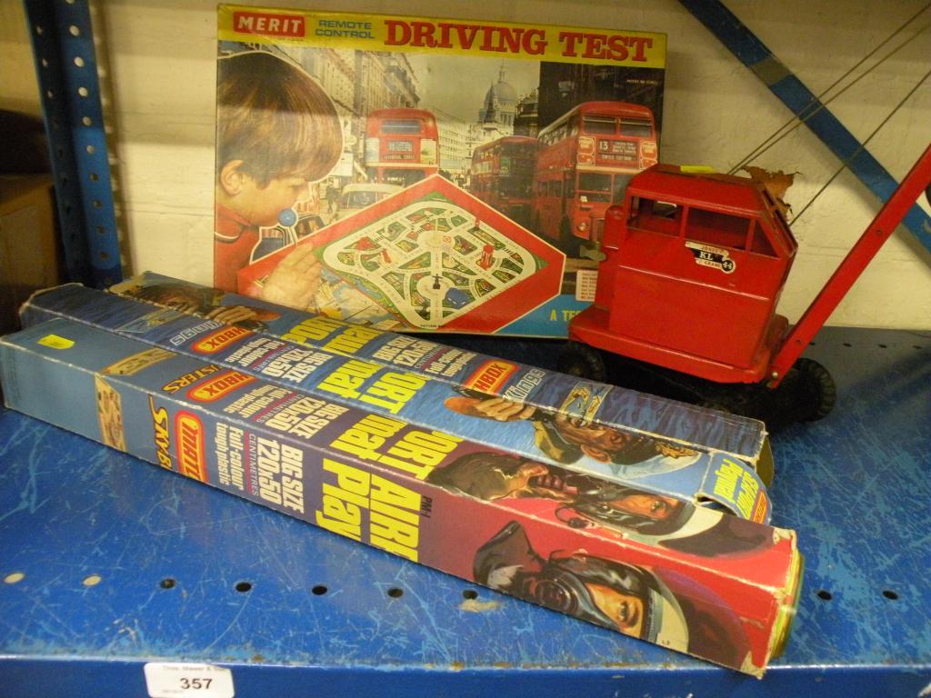 Appraisal: A Merit remote control driving test game three Matchbox play