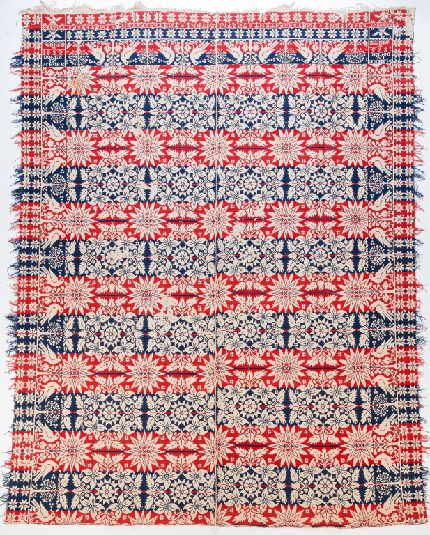 Appraisal: AMERICAN JACQUARD COVERLET Wool Two piece in red blue and