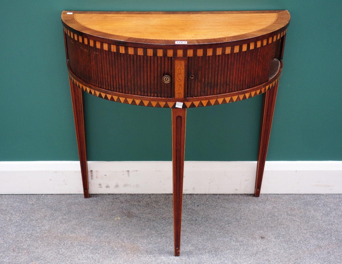 Appraisal: A th century mahogany and inlaid Dutch demi-lune side table