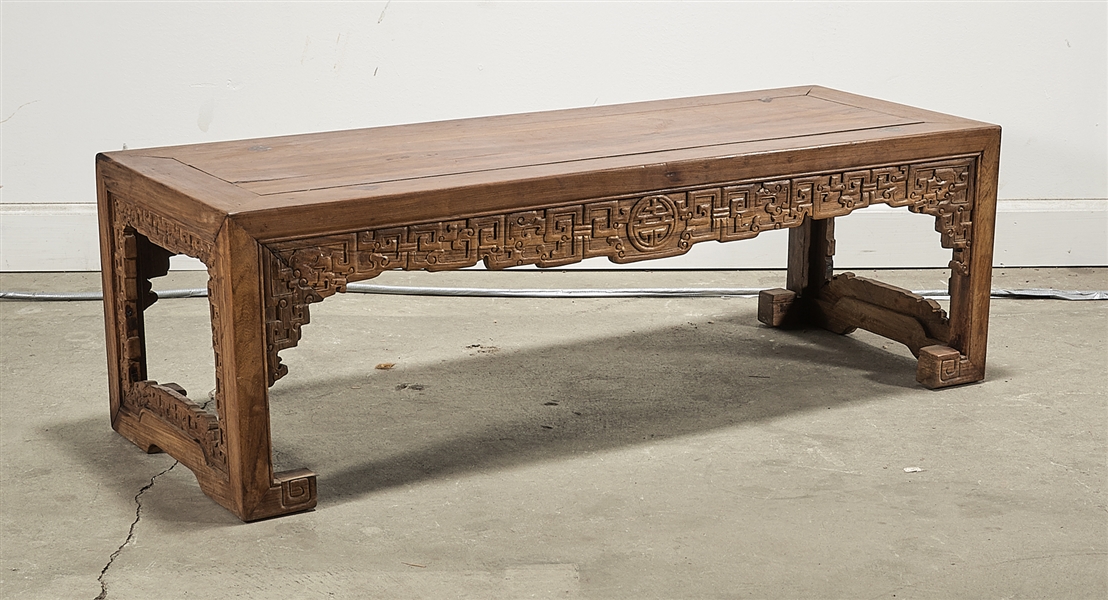 Appraisal: Chinese low hard wood table with carved apron design x