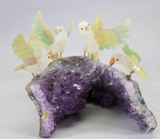 Appraisal: Carved Stone Birds on Amethyst Geode Carved Stone Birds on