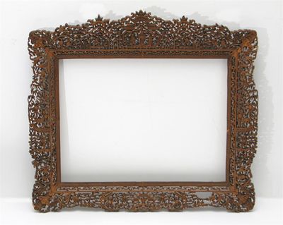 Appraisal: A Chinese carved wood frame reticulated and decorated with figures