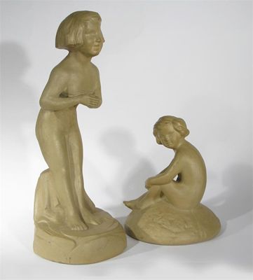 Appraisal: A Bretby Pottery figure modelled as a child standing on