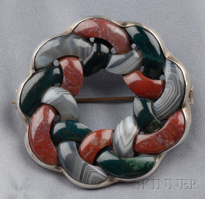 Appraisal: Victorian Silver and Scottish Agate Circle Brooch the buff-top agates