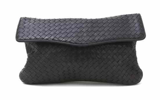 Appraisal: A Bottega Veneta Navy Woven Leather Envelope Clutch two interior