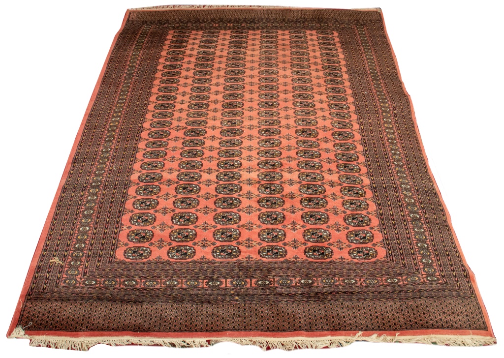 Appraisal: PEACH BOKHARA RUG X Peach-ground Bokhara wool rug carpet '