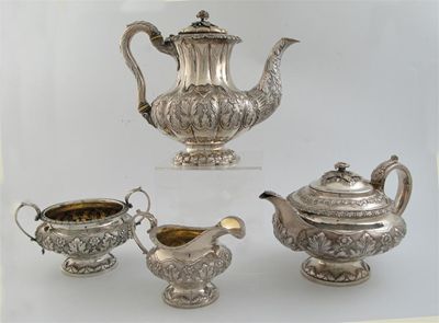 Appraisal: A George IV three-piece tea service circular with an embossed