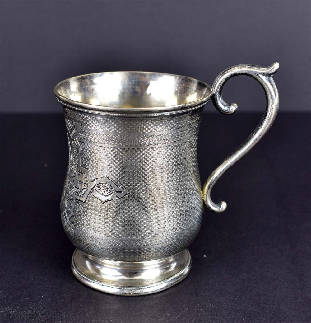 Appraisal: AMERICAN AESTHETIC MOVEMENT SILVER MUGCirca The underside marked H E