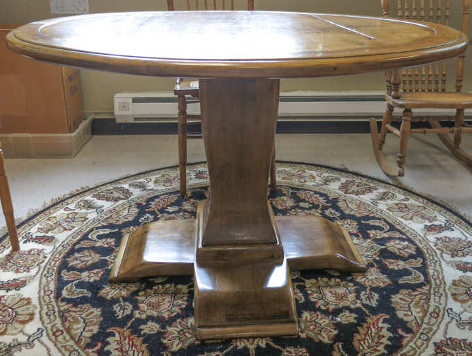 Appraisal: ROBERT SELIGER ROUND CUSTOM DINING TABLE Robert Seliger Trademark furniture