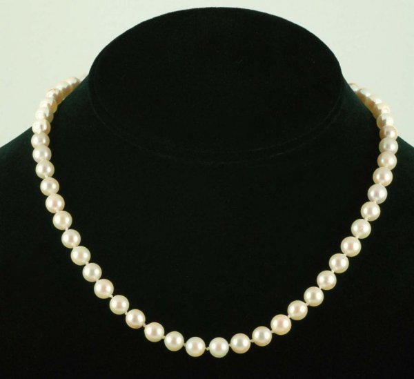 Appraisal: Pearl necklace with marked K white gold filigree clasp MEASUREMENTS