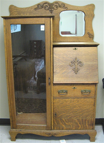 Appraisal: AN OAK SECRETARY BOOKCASE American c side-by-side design the left