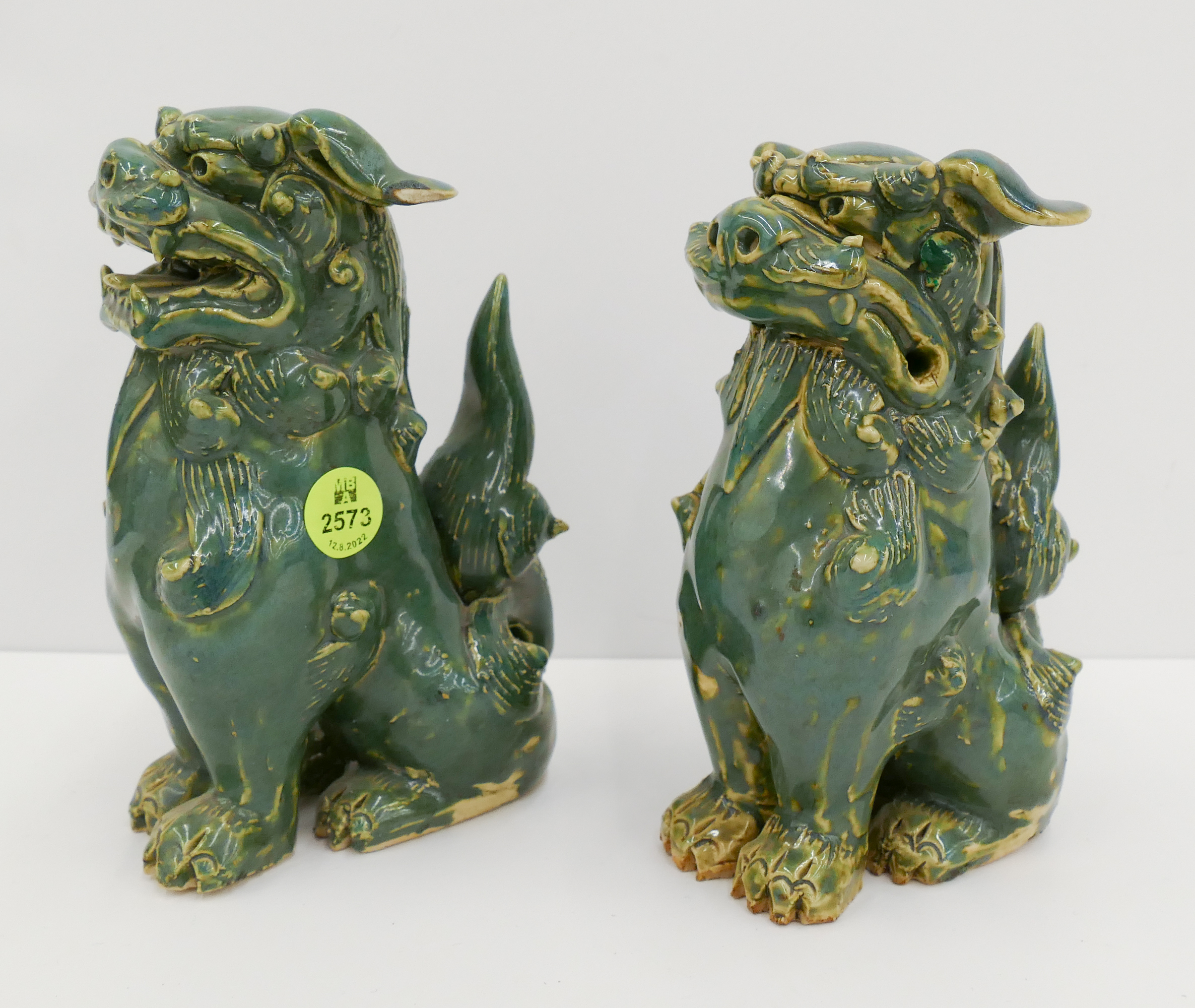 Appraisal: Pair Chinese Shiwan Pottery Foo Lion Figures- ''