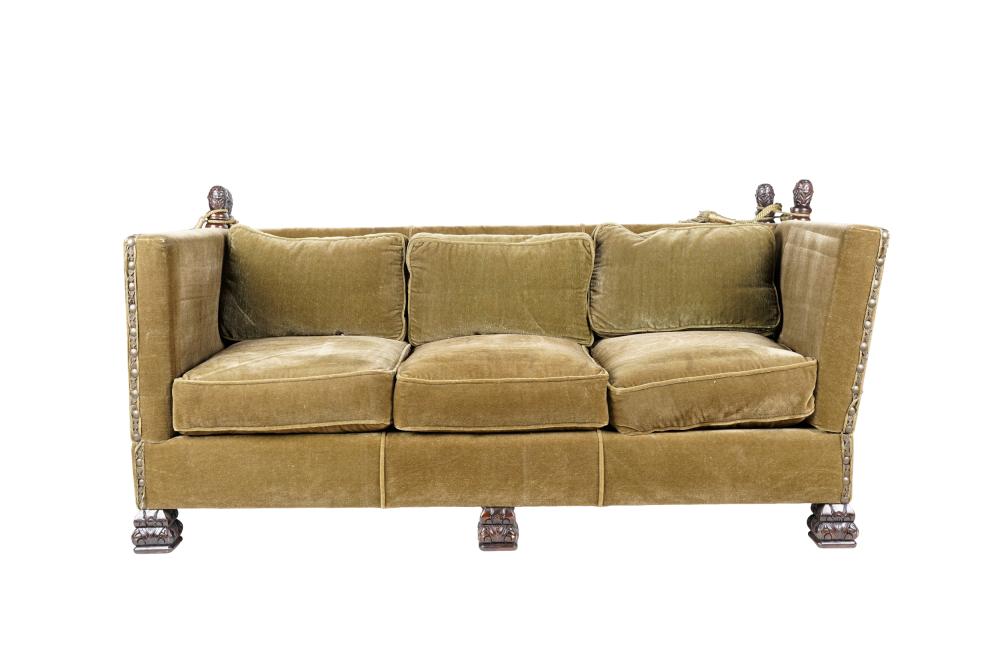 Appraisal: KNOLE SOFAcovered in olive green mohair with carved finials and