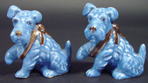 Appraisal: Two Sylvac blue glazed seated terrier dogs with bandaged paws