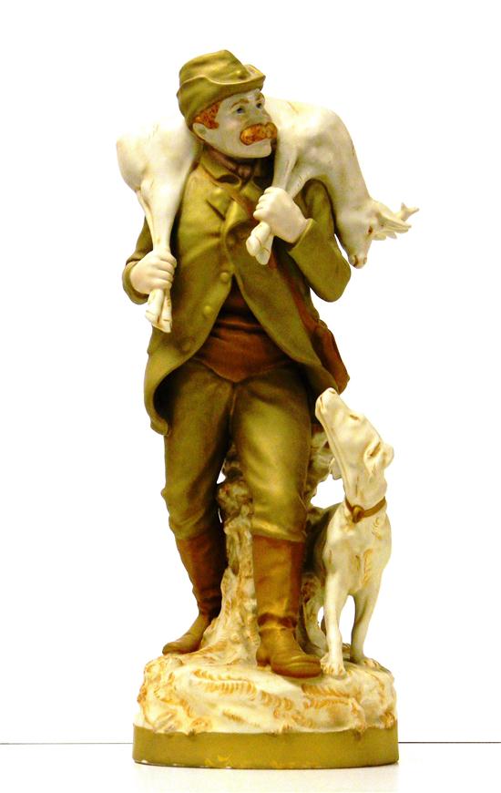 Appraisal: Royal Dux porcelain figure hunter with stag on shoulders hound