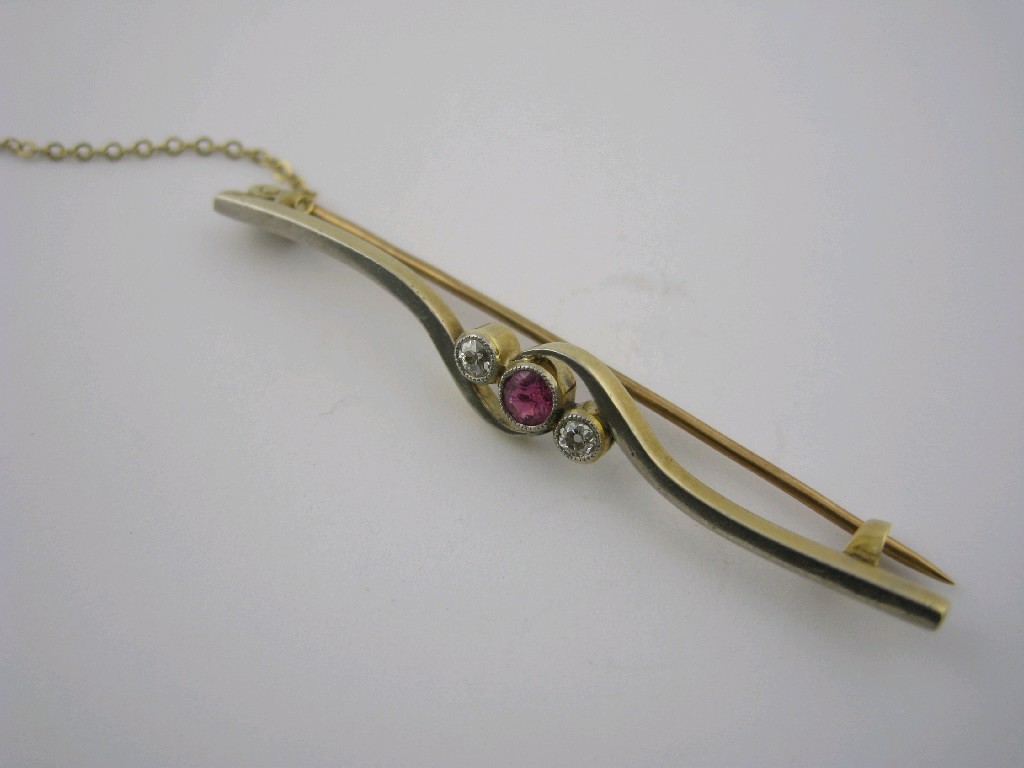 Appraisal: A Ruby and Diamond Bar Brooch the circular-cut ruby in