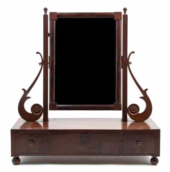 Appraisal: An English Mahogany Dressing Stand having a vertical rectangular mirror