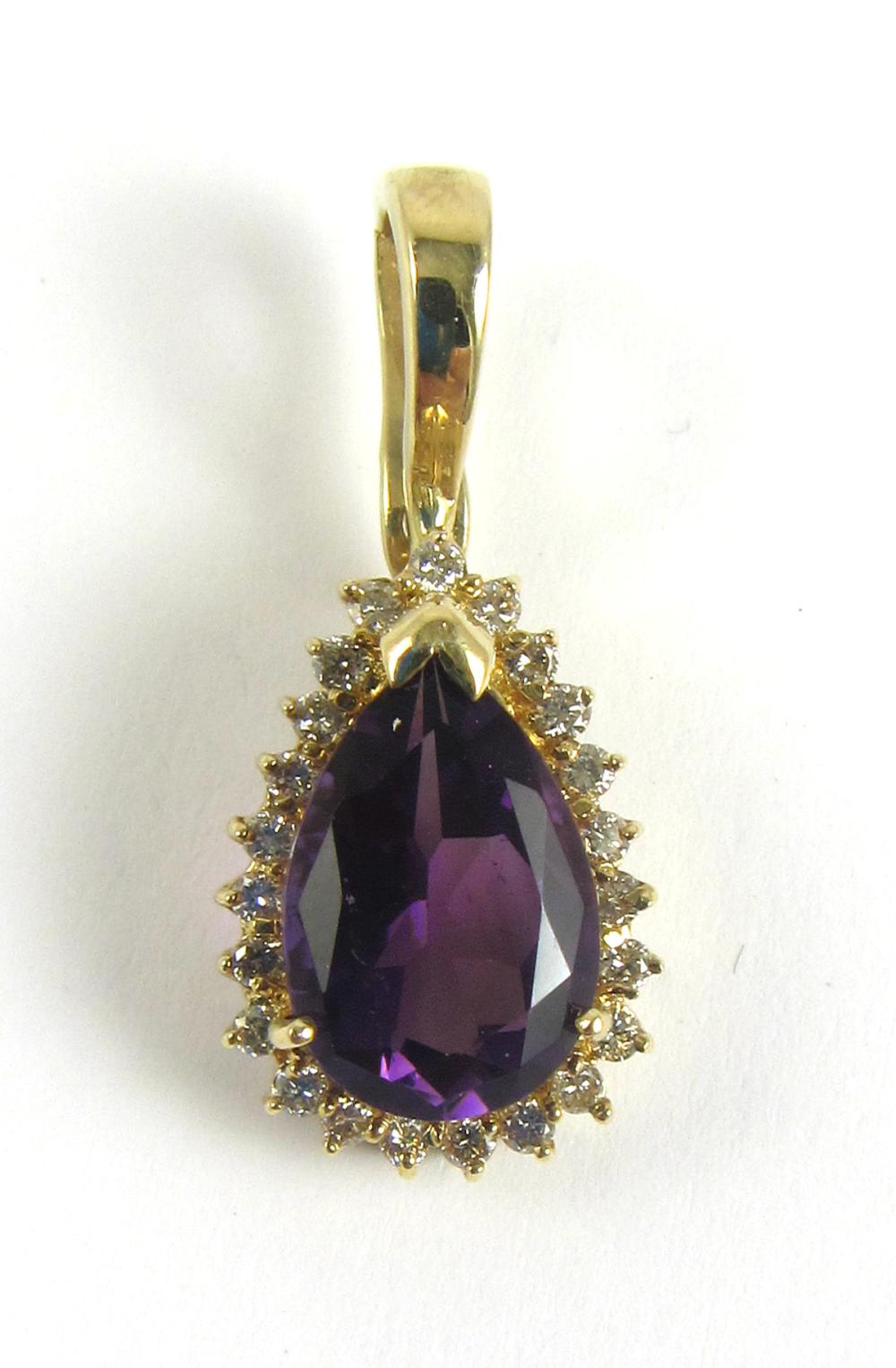 Appraisal: AMETHYST DIAMOND AND FOURTEEN KARAT GOLD PENDANT with round-cut diamonds